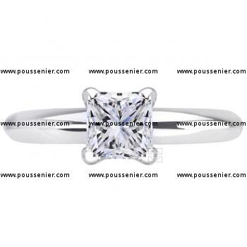 solitaire ring with a princess cut diamond set in four prongs
