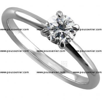 handmade solitaire ring with a brilliant cut diamond set in 4 prongs rounded setting made of round wire