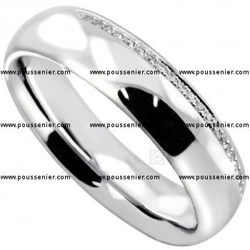 wedding ring slightly rounded completely half set with brilliant cut diamonds on the edge