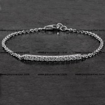bracelet rolo or força with half a curved bar with brilliant cut pavé set diamonds finished with fillet or engraving