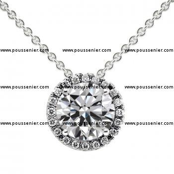 halo pendant with a larger central brilliantly set with four claws and surrounded with smaller brilliant-cut diamonds