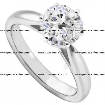 solitaire ring with a brilliant cut diamond set with four claws on a shank with palmets