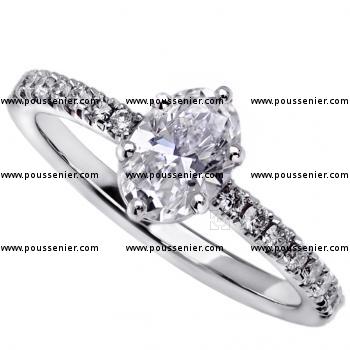 solitairering with oval cut diamond and pavé set brilliant cut diamonds on the side