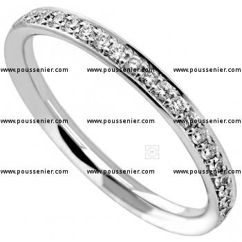 eternity ring slightly rounded inside and outside and completely set with small brilliant cut diamonds