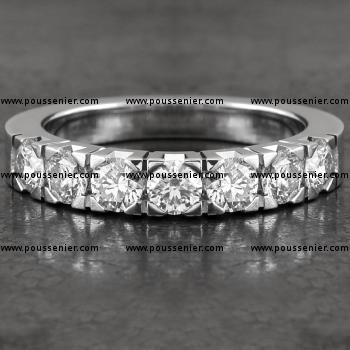 wedding ring with brilliant cut diamonds set in square block chatons