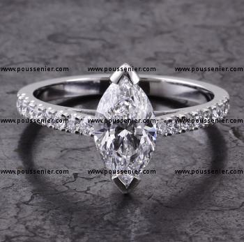 solitaire ring with a marquise cut diamond and brilliant cut on the side