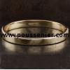 slim hollow bangle or esclave bracelet with a rectangular profile and hinge and box clasp