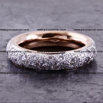 rounded ring with pavé random set brilliant cut diamonds with the rounded inside rhodinated with rose gold
