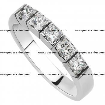 wedding or anniverasy ring with princess cut diamonds set in square blockchatons