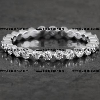 alliance with brilliant cut diamonds set with two prongs or claws closed at the bottom for engraving