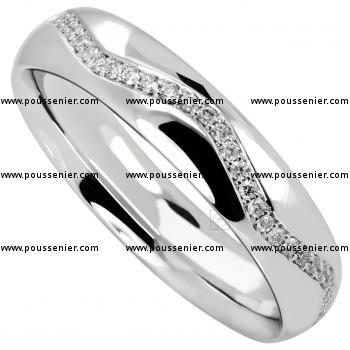 wedding ring slightly rounded outside and inside and half wavy set with brilliant cut diamonds