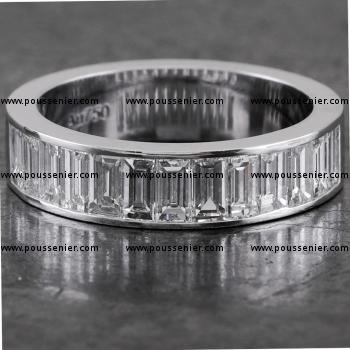 alliance ring about half set in raille with baguette cut diamonds