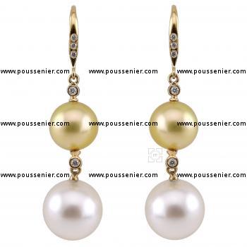 pearl earrings with brilliant cut diamonds and a yellow and white South Sea pearl on a hook