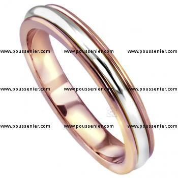 hand made wedding ring with three rounded bands and the outer bands slightly lower soldered togehter forever