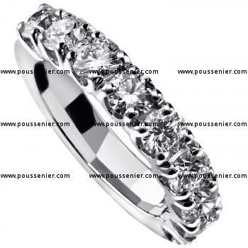 alliance ring or wedding band with round brilliant cut diamonds set in four V-shaped prongs