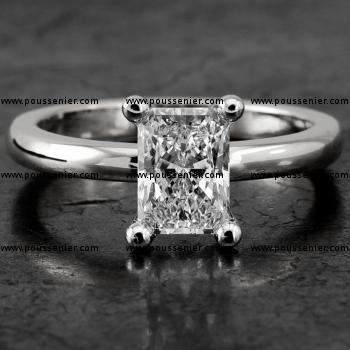 Handmade solitaire ring with a radiant cut diamond set with four round prongs on a rectangular band slightly rounded at the top, such as and can be worn together with RG0886AH/25