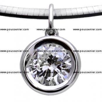 solitaire pendant with a brilliant cut diamond in a donut setting on a fine bracket