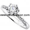 solitaire ring with a brilliant cut diamond set in 6 prongs tiffany setting with castle set smaller diamonds on the side