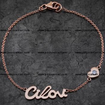 bracelet with a logo of nameplate "Cilou" and a heart American set with a brilliant cut diamond