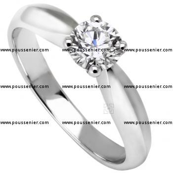 solitaire ring with a brilliant cut diamond set with four prongs
