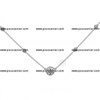 thinner rolo necklace with a lager bezel set brilliant cut diamond flanked by donut set smaller brilliants