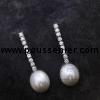 pearl earrings with a row of brilliant cut diamonds with a teardrop-shaped white cultured pearl