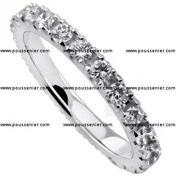anniversary ring with brilliant cut diamonds castle set with some more space between the diamonds
