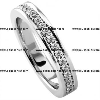 hand made wedding ring half set with brilliant cut diamonds set in pavé with a slightly wider border
