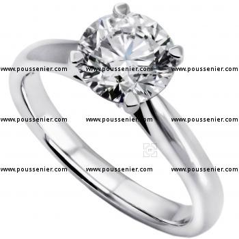 solitaire ring with a brilliant cut diamond set in 4-prong setting and palmets on the side
