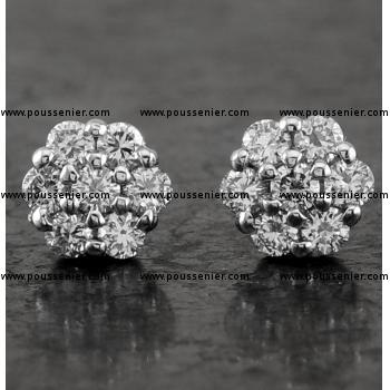 handmade flower earrings with brilliant cut diamonds set with prongs (six in the middle)