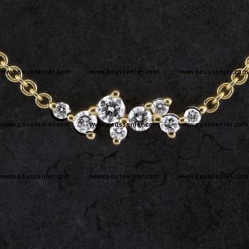 necklace rolo with a whimsical line or graphic with prongs set brilliant cut diamonds (extra eyelets at 2.5 and 5 cm)