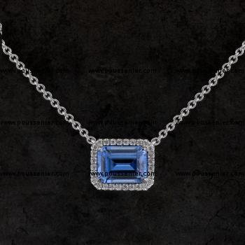 entourage pendant with an emerald cut aquamarine surrounded by smaller brilliant cut diamonds mounted on a força or anchor chain (extra ring at 1.5cm and 3cm)