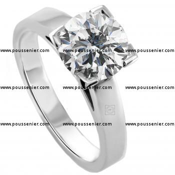 solitaire ring with a brilliant cut diamond set in 4 square prongs