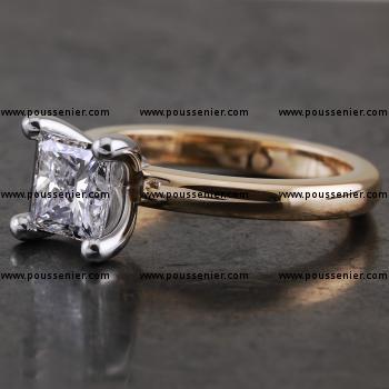 Handmade solitaire ring with a princess cut diamond set with four round prongs on a rectangular band slightly rounded at the top, such as and can be worn together with RG0886AH/25