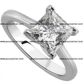 handmade solitairering with a princess cut diamond set in four square prongs on a shank with small palmets