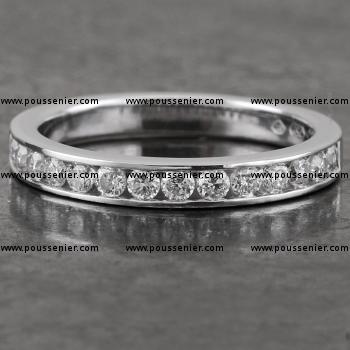 wedding ring about half channel set with brilliant cut diamonds