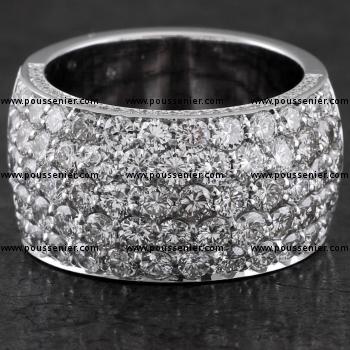 solid pavé ring lightly bulbous set with brilliant cut diamonds zigzag microscope setting above and aside set and finished with an engraving or fillet