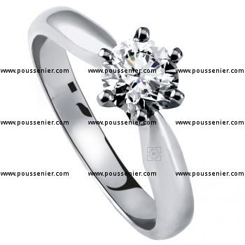 solitaire ring with a brilliant cut diamond set in four prongs without ring beneath