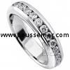 half round wedding ring half channel set with a row of brilliant cut diamonds and below finished with a trench or engraving