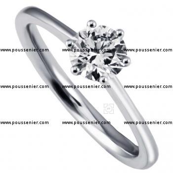 handmade solitaire ring with a brilliant cut diamond set wit six conic straight claws on a thin shank