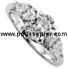 elegant and fine trilogy ring with a central oval cut diamond flanked by two pear shaped diamonds set with claws
