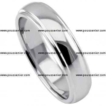 wedding ring with a central smaller slightly rounded band completely handmade