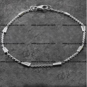 charm bracelet rolo with bezel set taper cut diamonds
