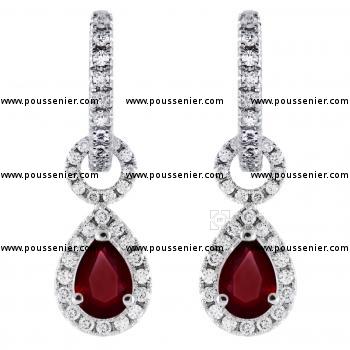 creole earrings with entourage pendants and 2 central pear shaped rubis surrounded by smaller brilliant cut diamonds