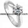 solitaire ring with a brilliant cut diamond set with six prongs mounted on a rounded roof shaped schank