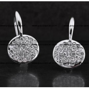 pavé earrings with a round disc random pavé set with single cut diamonds mounted on clips