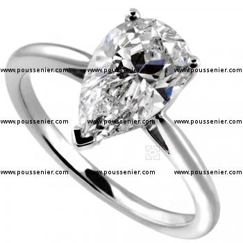 ring brilliant with a pear cut diamond set in three prongs on a rounded shank with palmets