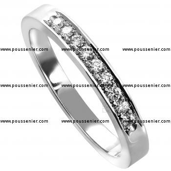 wedding ring pavé set with brilliant cut diamonds finished with a engraved border