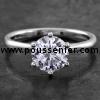 handmade solitaire ring with a brilliant cut diamond set in 6 prongs rounded setting made of round wire
