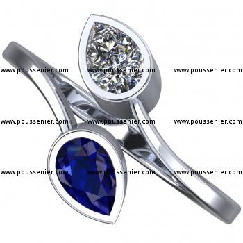toi et moi ring with a pear cut diamond and a pear shaped sapphire bezel set in a closed basket
